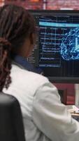Vertical Happy programmer celebrating after successfully implementing code using artificial intelligence computing. Cheerful employee excited after finishing work on AI deep neural networks on PC, camera B video