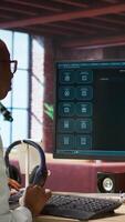 Vertical Woman at home asks questions to AI LLM chatbot virtual assistant answering user prompts. Person receiving helpful information from artificial intelligence large language model program on PC, camera A video