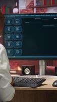 Vertical Woman at home asks questions to AI LLM chatbot virtual assistant answering user prompts. Person receiving helpful information from artificial intelligence large language model program on PC, camera B video