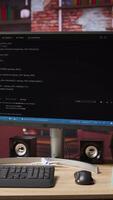 Vertical Programming language code editor software displayed on PC screen in home workspace, illustrating technology driven collaboration and highlighting lines of code powering diverse digital solutions video
