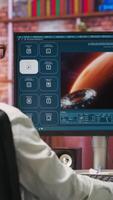 Vertical Person at home getting tasks done with AI program turning text prompt into videos. Woman using computer to make use of text to artificial intelligence generative models, camera B video