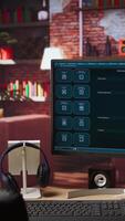 Vertical Focus on AI LLM chatbot GPT software on PC monitor in modern home office. Jib down shot of large language model application on computer display communicating with user through artificial intelligence video