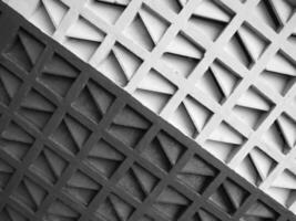black and white photo of a building with geometric patterns