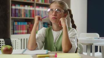 Thinking girl Caucasian pupil student schoolgirl thoughtful search think ponder child kid daughter studying school education study learn exam create idea happy find answer clever insight brainstorm video