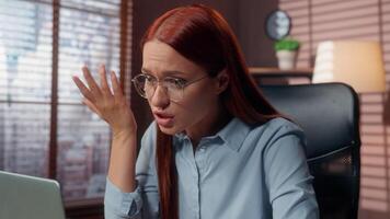 Angry talking furious problem discuss company CEO anger dissatisfied failure talking call conference close laptop finish negotiation in office businesswoman Caucasian business woman girl female video