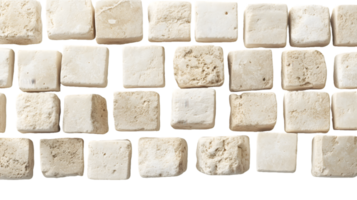 Close-up of Small Beige Square Stone Tiles Arranged in Rows png