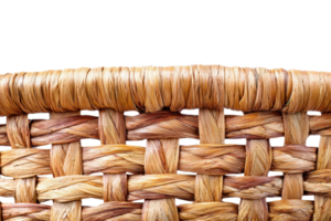Close-up of a woven wicker basket showcasing intricate weaving patterns and natural texture in a detailed and artistic composition. png