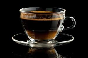 A cup of coffee on a saucer with a black background photo