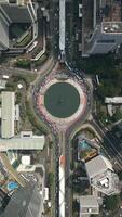 Aerial View Of Traffic At Roundabout With Selamat Datang Monument In Jakarta video