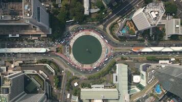 Aerial View Of Traffic At Roundabout With Selamat Datang Monument In Jakarta video