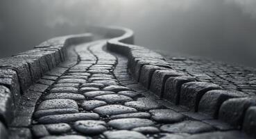 Dark gray cobblestone pathway with textured surfaceDark gray cobblestone pathway with textured surface. photo