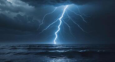 A Majestic Lightning Bolt Illuminates the Dark Ocean Below Creating an Awe Inspiring Contrast of Nature's Power and the Tranquility of Water photo