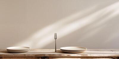 fork and plates on a wooden table with copy space image place for adding text or design photo