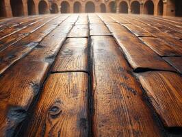 A close-up view of a polished wooden floor, showcasing its rich texture and grain patterns. photo