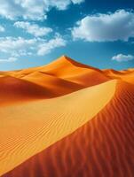 A serene desert landscape featuring rolling sand dunes under a bright blue sky. photo