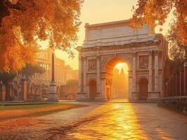 A golden sunrise illuminates the Arch of Constantine in Rome, surrounded by autumn foliage. photo