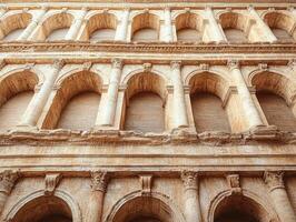 Detailed view of the Colosseum's arches, showcasing ancient Roman architecture. photo