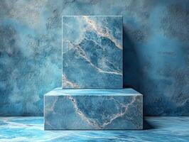 A minimalist display featuring blue marble blocks against a textured blue wall. photo
