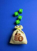 Figures of people falling into a bag of money. The concept of hiring workers and getting a share of profit from their work. Business and Commerce. Human resources. Investments, investors. Customers photo