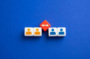 Separation of people. Separation concept. Create two new teams. Turn the group into pairs. Conflict resolution. photo