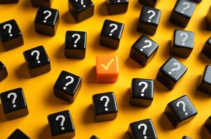 An orange check mark among many question marks. Correct answer. Task completion. Open achievement. Many unknown things and challenges. Fulfillment of requirements. photo