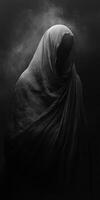 Mysterious figure cloaked in dark fabric in ethereal environment photo