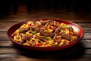 Savory beef stir-fry with noodles and colorful vegetables on a wooden table photo