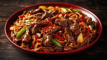 Savory beef stir-fry with noodles and colorful vegetables at dinner photo