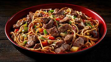 Sizzling beef stir-fry with noodles and vegetables in a bowl photo