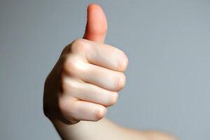 Hand Signals. Thumbs Up Gesture, a Positive Nonverbal Communication, Showing Approval and Agreement Universally, Demonstrating Consent and Satisfaction Enthusiastically. photo
