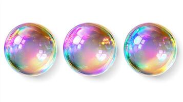 Three iridescent soap bubbles on a white background. photo
