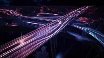 Nighttime Highway Interchange with Light Trails photo