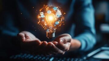Illuminated Light Bulb Held by Hands with Gears and Sparks photo