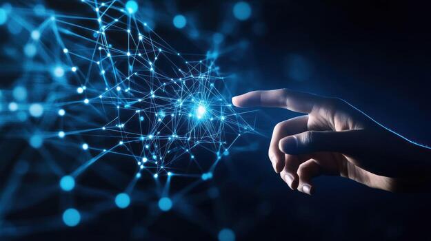Hand Interacting with a Glowing Blue Network photo