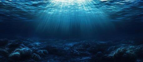Underwater Scene with Sunbeams Illuminating the Ocean Floor photo