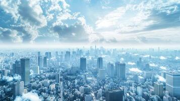Aerial View of a Dense Cityscape with a Blue Sky and Clouds photo