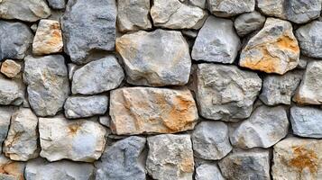 Raw concrete and natural stone wall showcases rustic construction with mixed gray tones, featuring embedded stones and rough surface patterns, creating industrial architectural detail with weathered photo