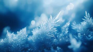 Detailed macro view reveals delicate ice crystal formations with translucent blue frost patterns, showcasing geometric structures and ethereal frozen shapes in natural mineral arrangements. crystal photo