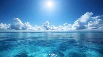 Tropical paradise scene combines pristine blue sky with crystal-clear turquoise waters, revealing vibrant coral reef beneath surface while white cumulus clouds float overhead. pristine photo
