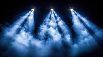 Brilliant beams of blue light pierce through thick fog, creating an enchanting atmosphere photo