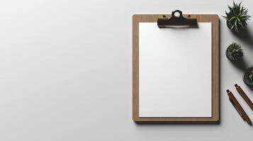 A clean workspace featuring a blank clipboard and elegant stationary photo