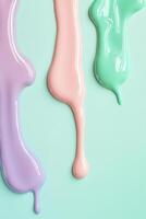 Colorful drips of pastel nail polish create a fun and cheerful background perfect for artistic expression and promotional text photo