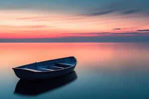 A serene Nordic sunset paints the sky with soft pink, orange, and blue hues while calm waters create perfect reflections. A small wooden boat adds elegance to this tranquil landscape photo