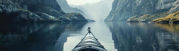 A sleek kayak glides effortlessly across the tranquil waters of a Nordic fjord, enveloped by majestic cliffs and soft morning light. The peaceful atmosphere invites adventure photo
