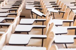 Lecture chairs in a class room photo