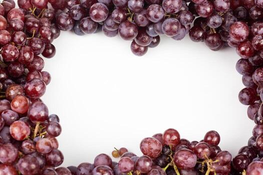 Grape frame on white background with copy space for your text. photo