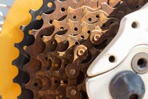 Close up of old and rusty bicycle gear Selective focus with shallow depth of field. photo