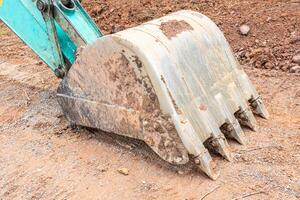 excavator machine working on the construction site, close-up photo