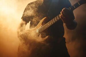 A guitarist performs passionately on stage amidst a cloud of smoke during a live music concert in a dimly lit venue photo
