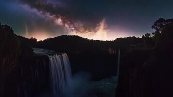 waterfall cascading down a rocky cliff photo